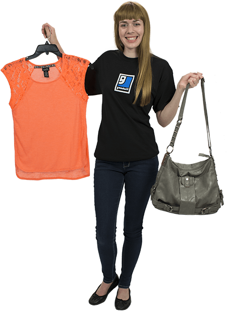 Goodwill Woman displaying awesome blouse and purse