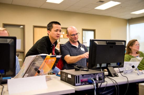 Man getting computer assistance