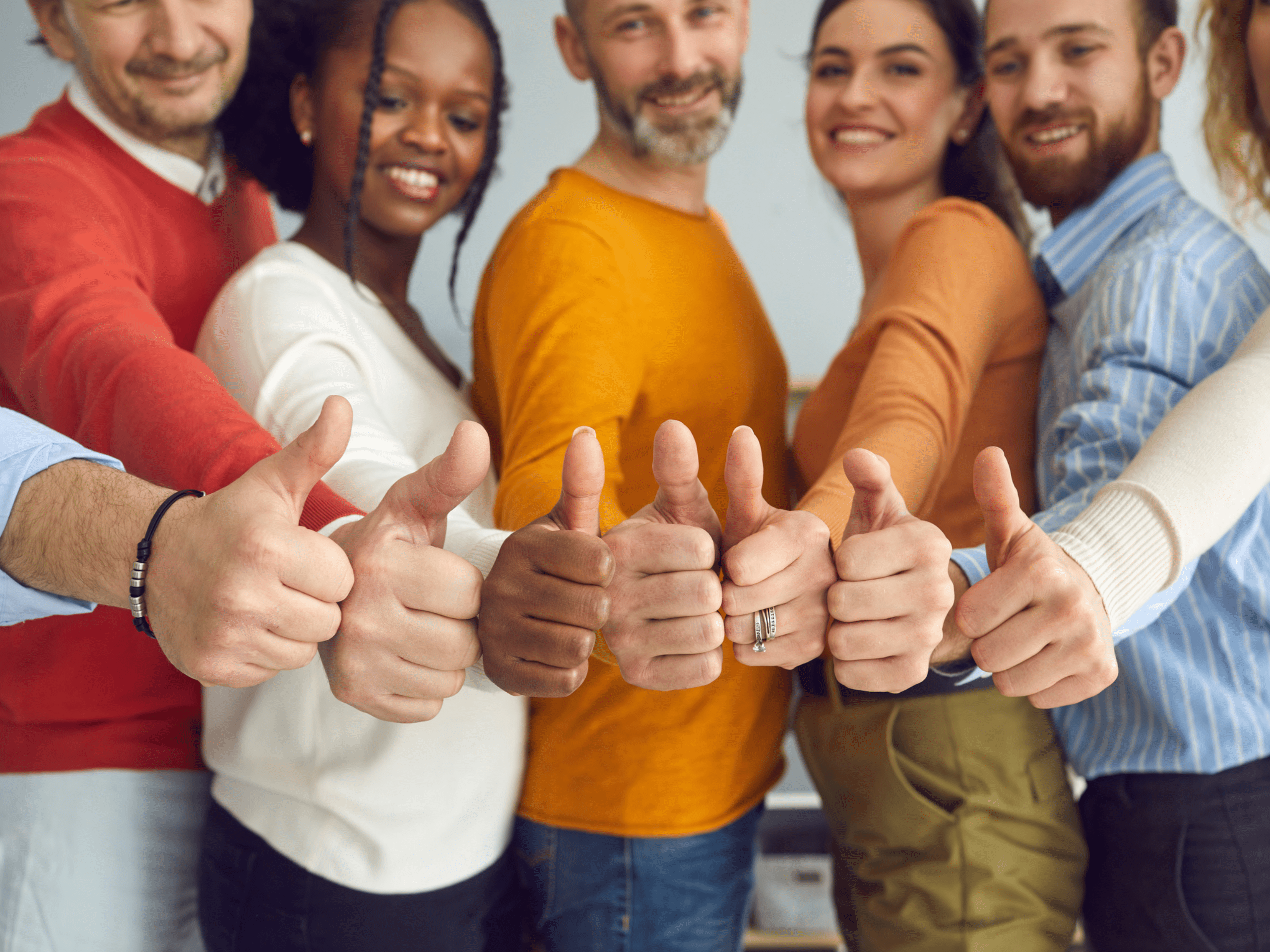 A group of happy workers after experiencing upskilling