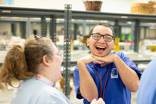 Goodwill workers have some fun. 